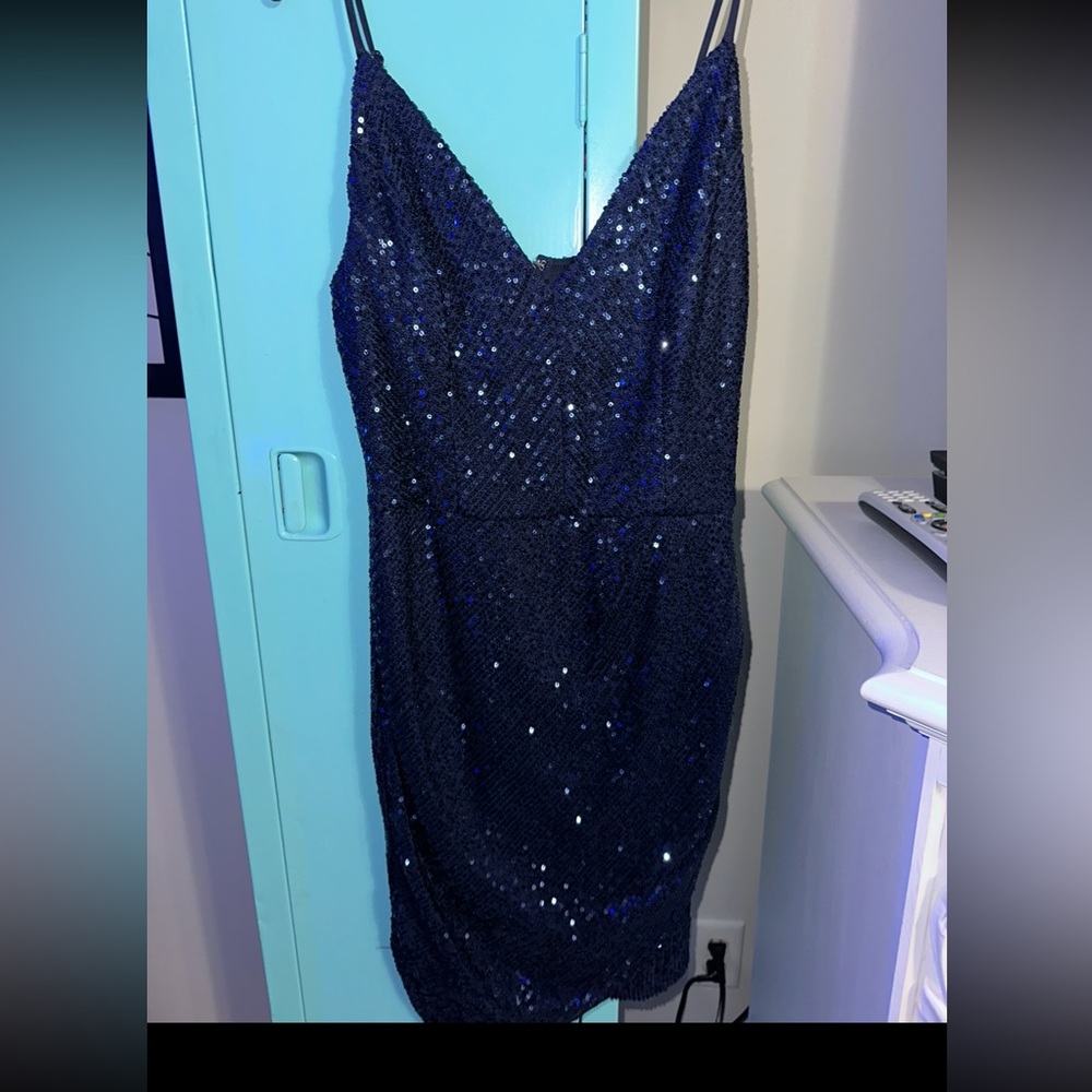 Blue dress from Dillards. Size 9 and made by Midnight Doll.